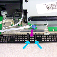 Step 5: Mount the Speed Control Module - The control module can be mounted perfectly inside the front vent holes of the PS3.  Insert the two screws into the vent holes as shown - second row from the front of the system.